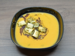 Pumpkin cream soup with salmon